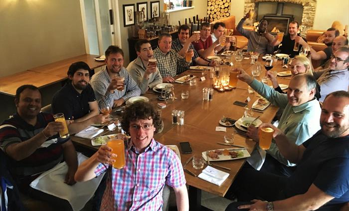 Team building group enjoying a meal with us